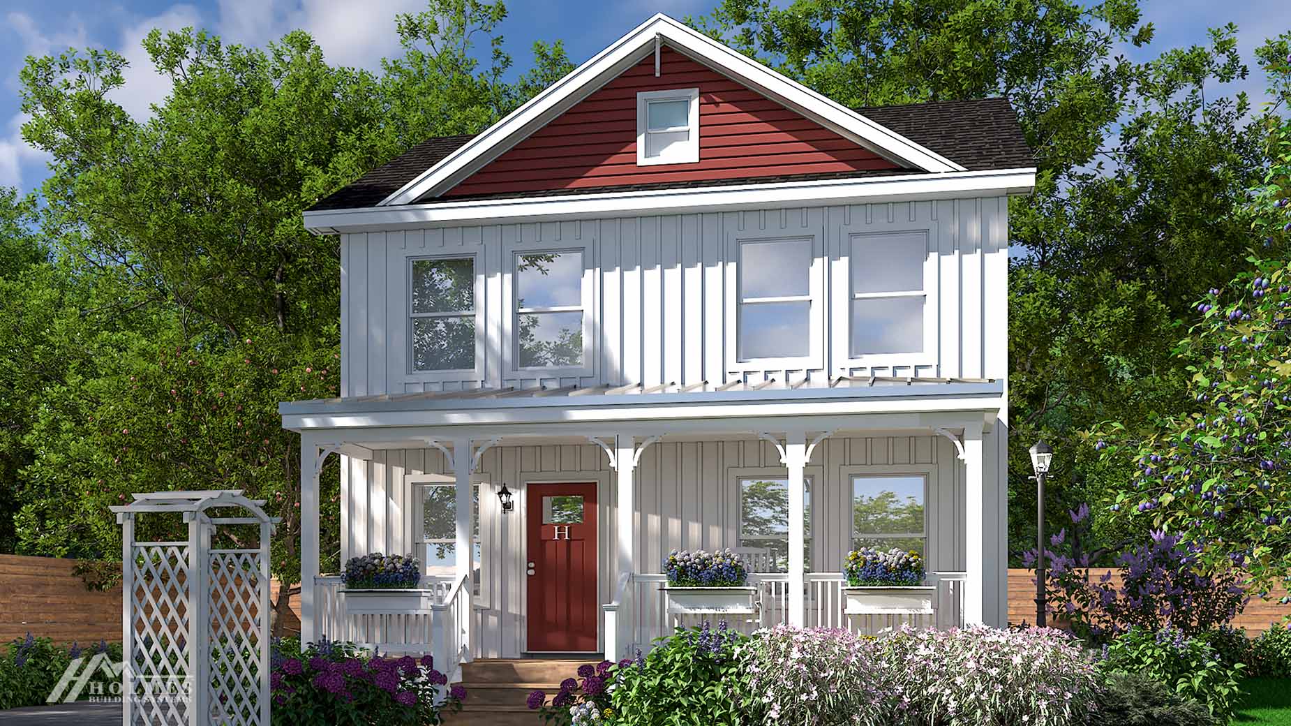 A charming two-story modular home with a white exterior, red gable, inviting front porch, garden, and lush green trees in the background.