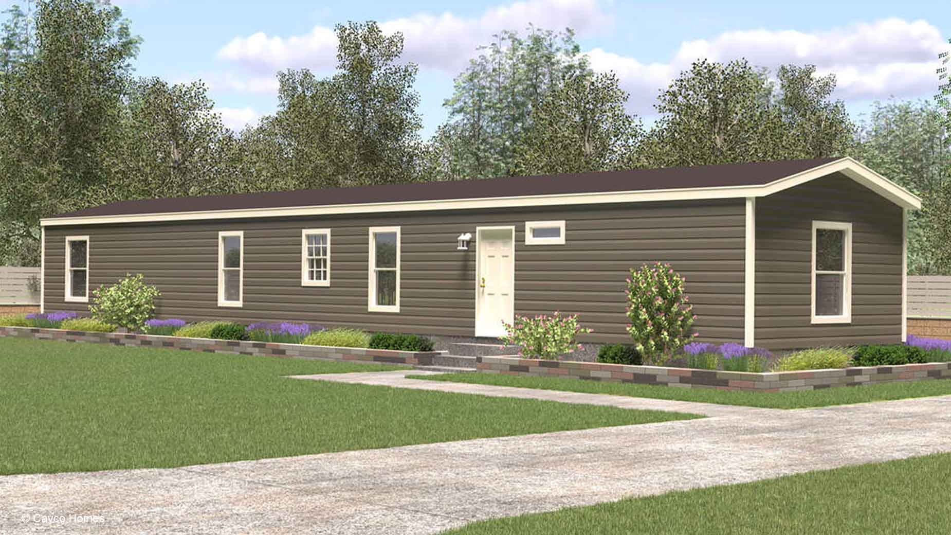 A long, single-story brown manufactured home rendering with white trim, front steps, and landscaped garden beds.